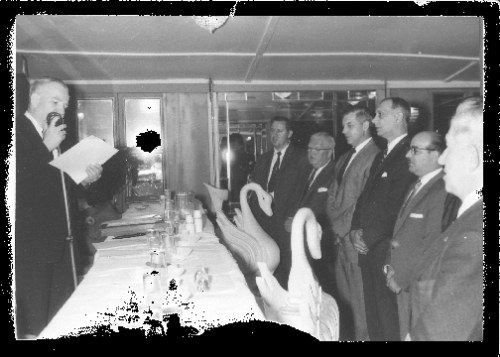 Founding Local 237 president Harry Feinstein (at microphone) inducts new officers of the Department of Water Chapter of Local 237 in 1952. Rear to foreground: Walter Ryczek, unknown, John Hartter, George Hauser, George Rosenbluth, and George Lodis